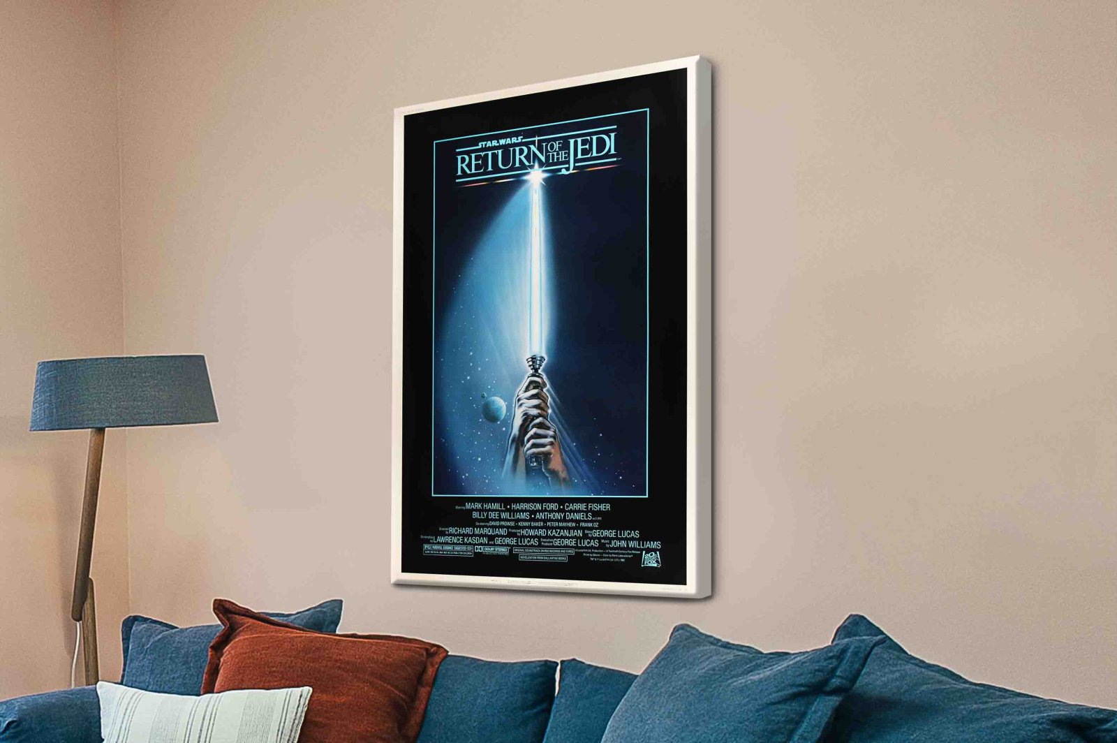 Return of the Jedi star wars canvas print white framed lightsaber poster above blue couch
