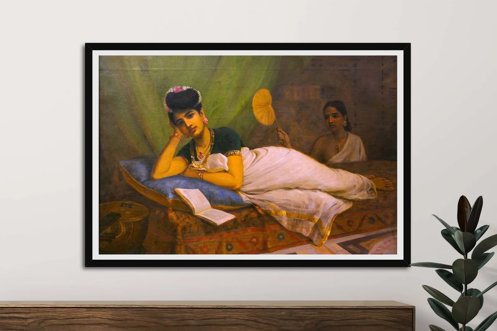 Framed print of Reclining Woman by Raja Ravi Varma, deep warm palette for a WA room