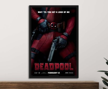 Framed print of Deadpool, high-contrast red-and-black comic-action mood, suited to a Perth games room or den.